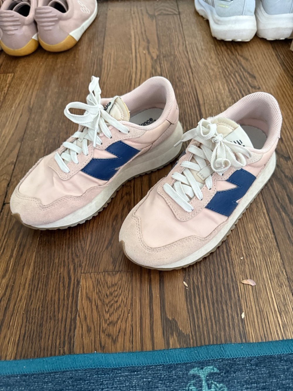 New Balance Women’s Blush Pink Sneakers with Navy Accent